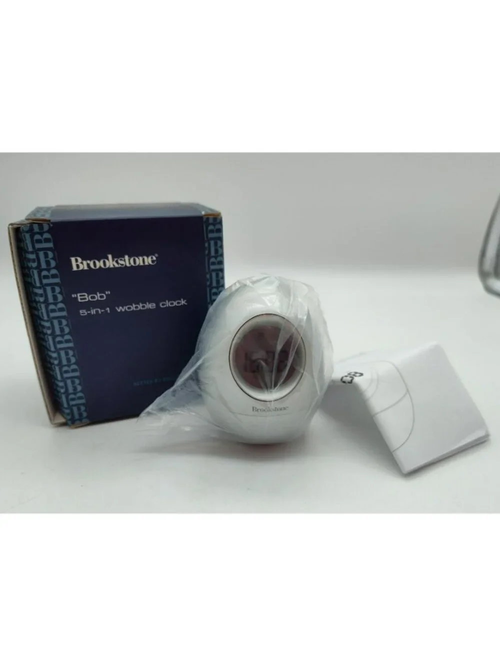 Brookstone Bob 5-In-1 Wobble Clock, Silver, New In Box, Alarm Snooze Temp Date
